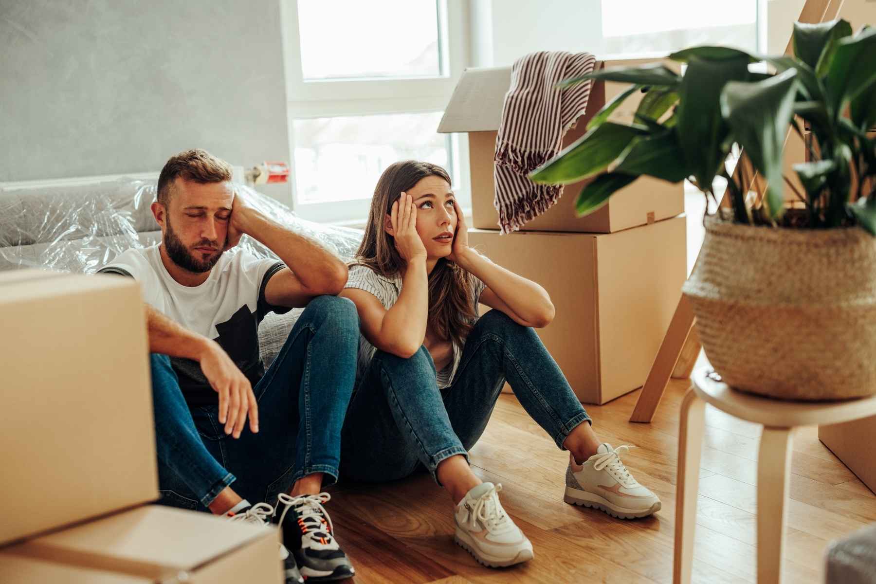 stressed couple doing a self move