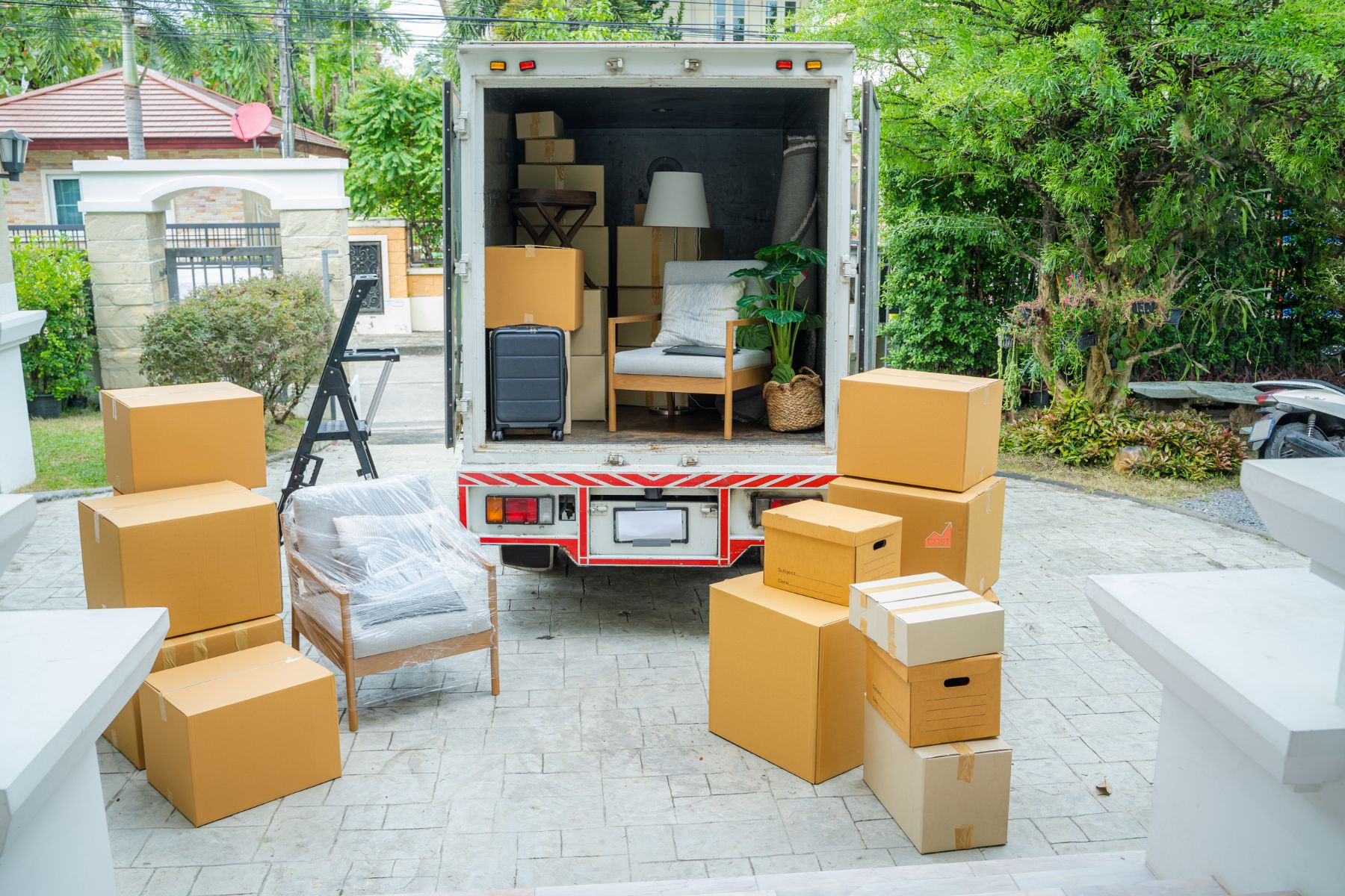 professional furniture removal team loading truck safely